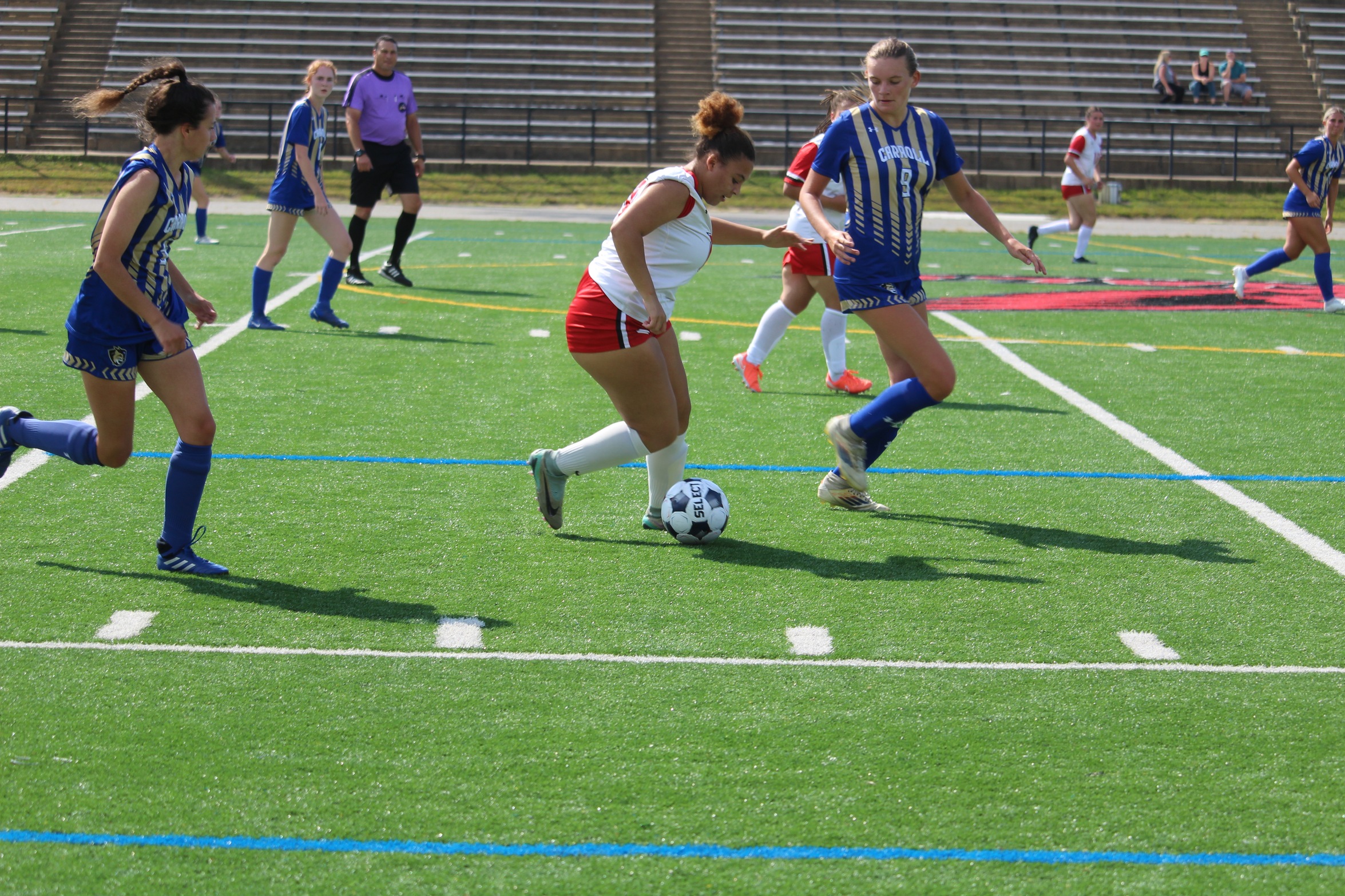 Lady Cardinals fall against Carroll losing 6-0.